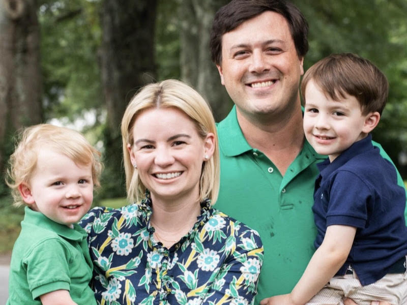 family photo of four people