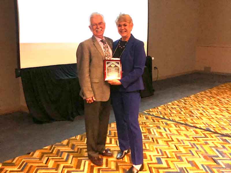 Receiving the NASF Scientific Award from Tony Revier.