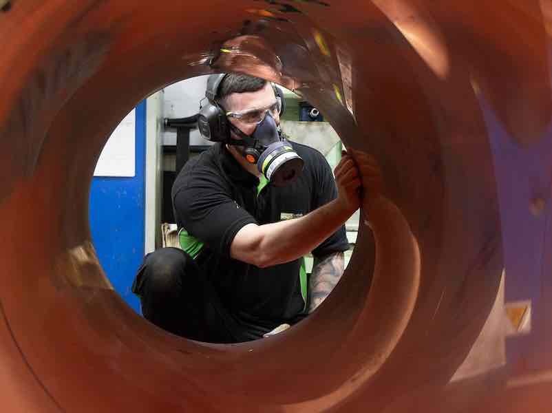 man plating copper parts