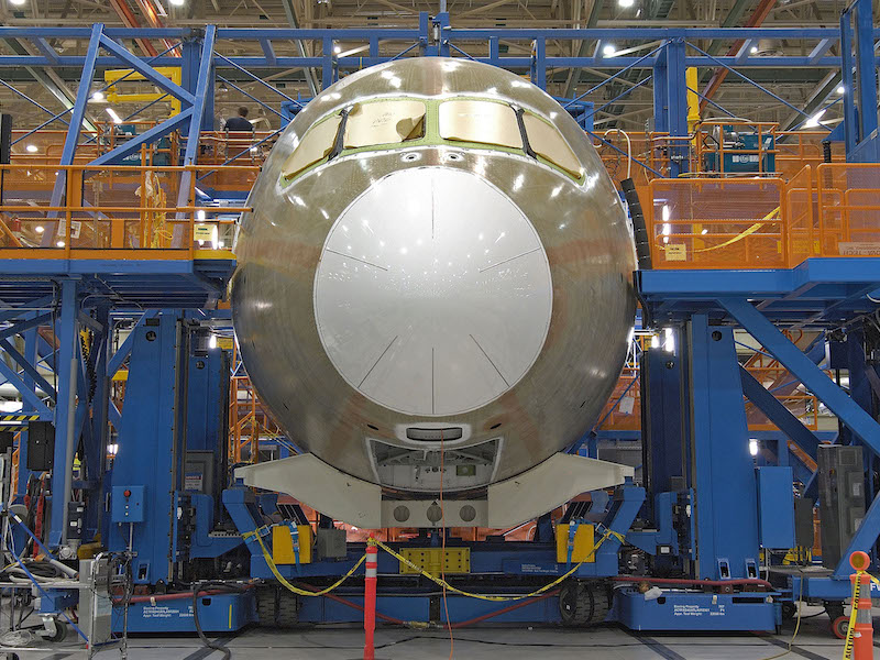 Boeing airplane under assembly in a factory