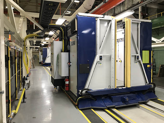 LASER PREPPED: A containment carrier holding a painted aluminum spar web is readied for a laser ablation test. Photo: Kady Gregersen
