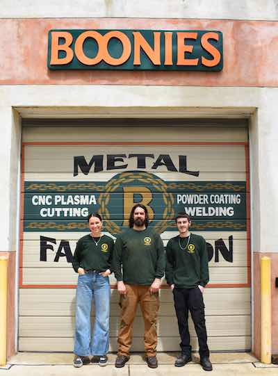 Jayna and Justin Roy, along with powder coat manager Pat Dunn.