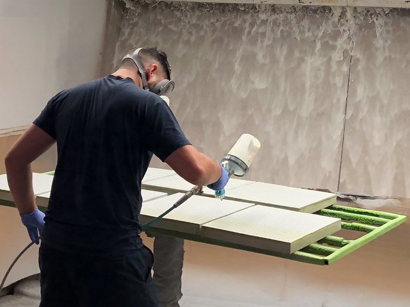 man coating parts