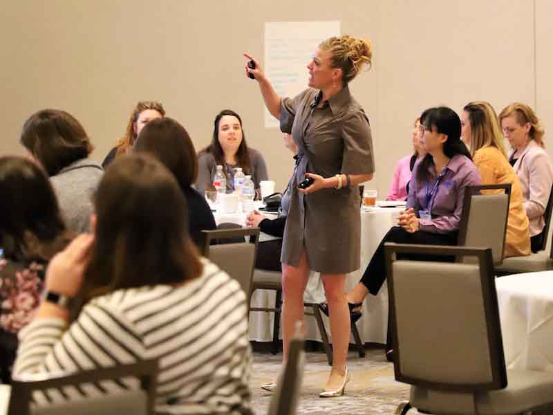 woman speaking to an audience