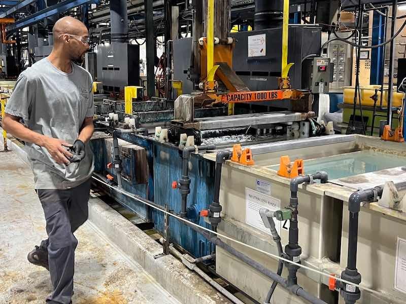 man working plating line