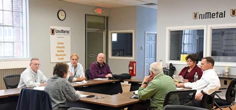 METAL members meet at UniMetal's offices to discuss curriculum for the electoplating coursework.