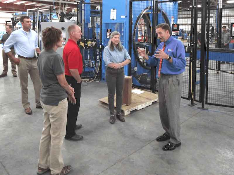 people getting a tour of facility