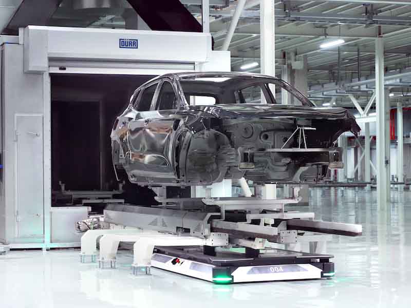 car going in a paint booth