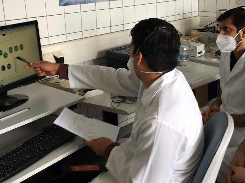 people looking at computer screen