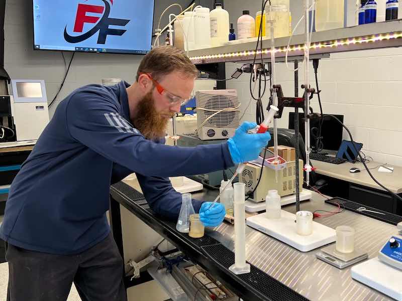 Owner Robert Hunsucker works in the quality lab at Future Finishes.