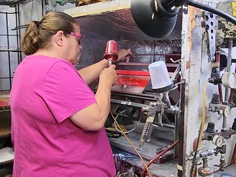 Cindy Hoffman spraying.