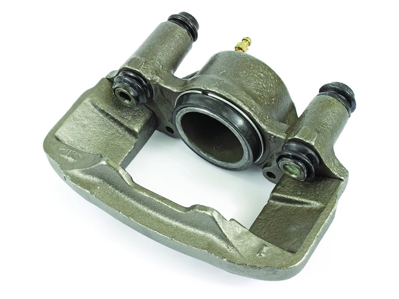 A brake caliper made of cast iron.