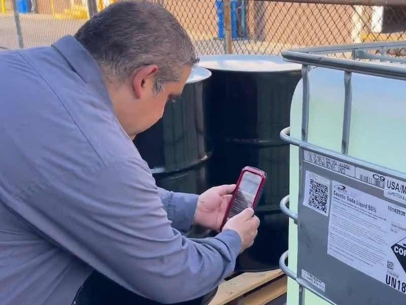 man scanning QR code