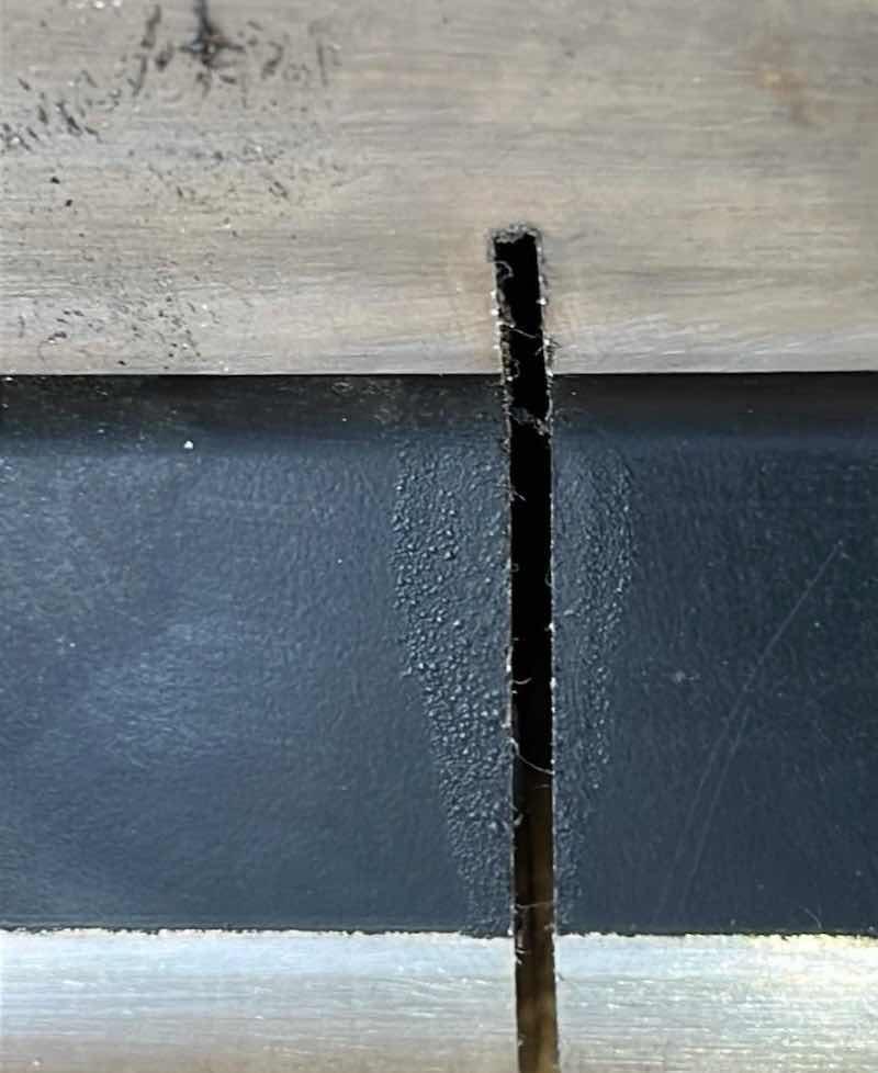 Figure 2: PTFE coating with a low coefficient of friction for continuous use up to 500Â°F (260Â°C) - damaged during cutting - burnt and dusty.