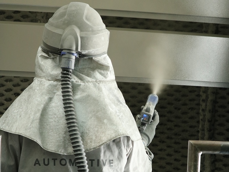 man spraytinmg coating