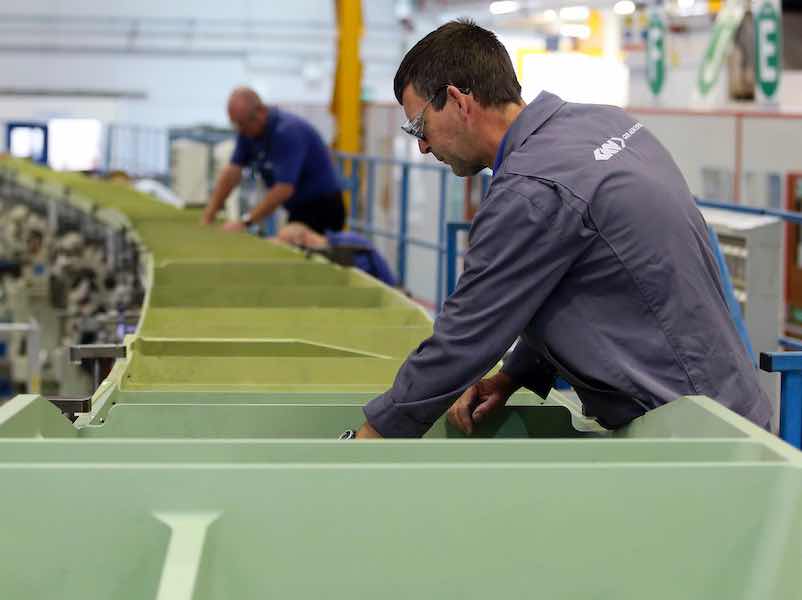 men working on parts