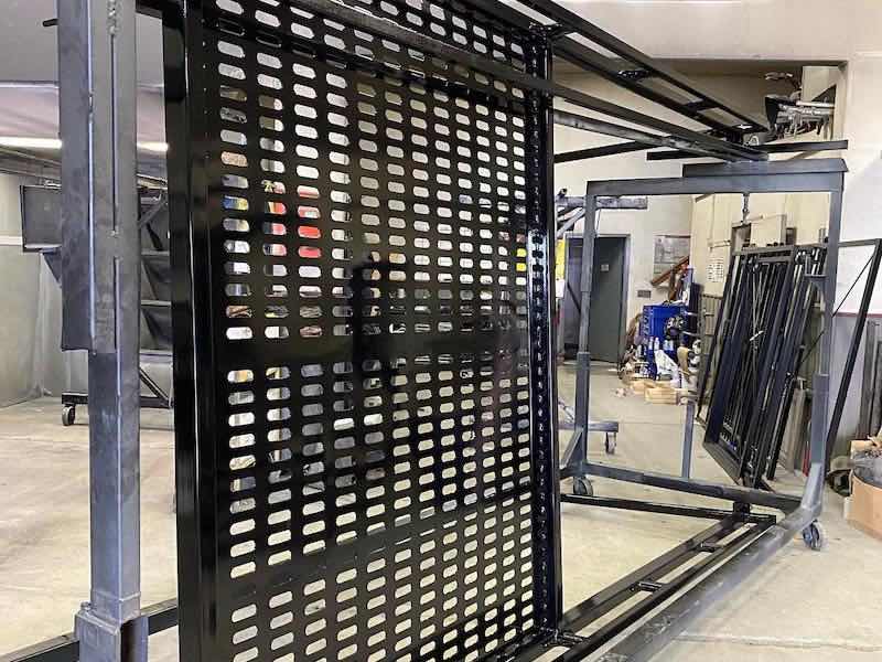 parts being powder coated