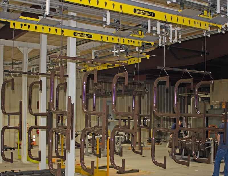 What caught the eye of Thomas and the companyâs management team was IntelliFinishingâs unique powder coating and liquid paint finishing equipment that uses friction-driven conveyors and smart controls to optimize production efficiency.