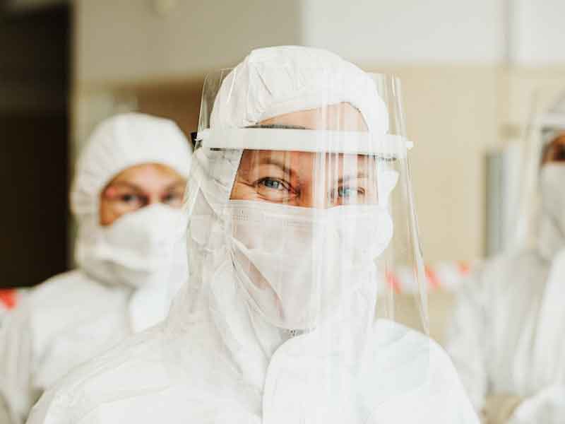 woman in hazmat suit