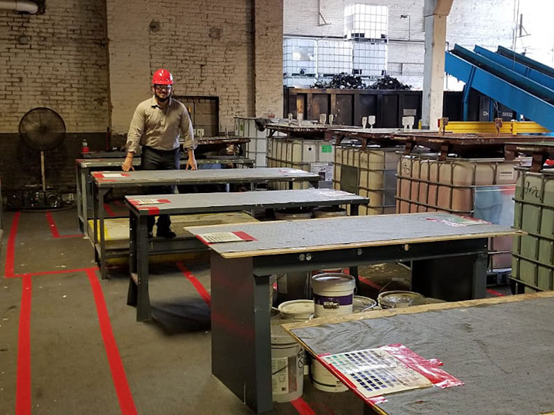 man standing at a table