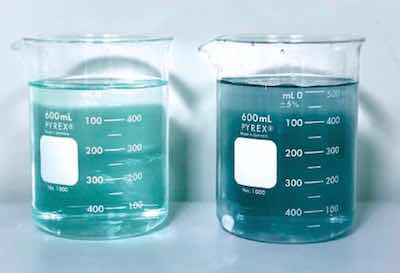 Dye contaminated seal bath, at right, and after carbon filtration, left.
