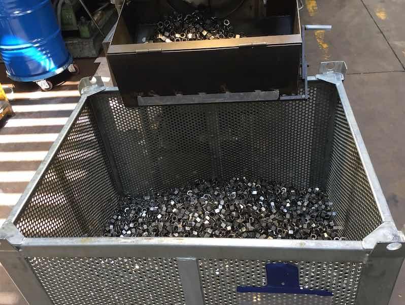 Metal parts still to be cleaned after stamping.