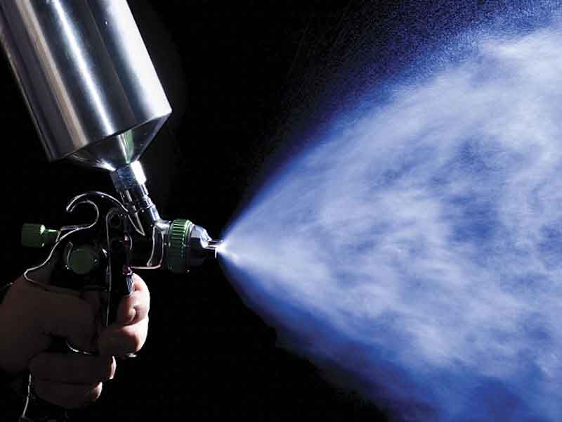 paint mist coming from a sprayer