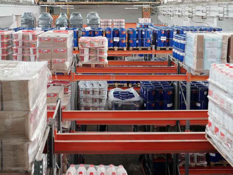 supplies on shelves in a warehouse