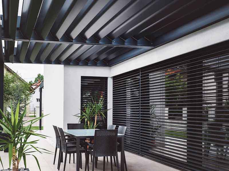 outdoor seating area with a table and chair