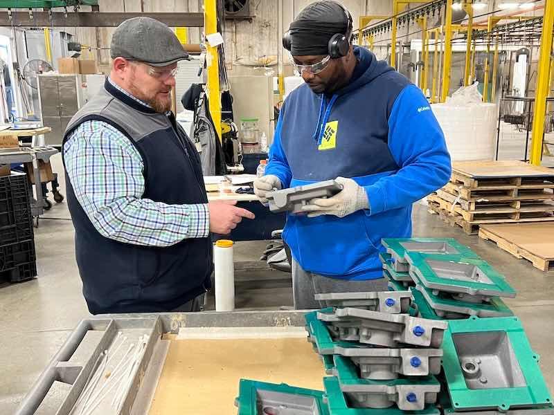 Josh Johnson, Operations Manager at Tri-State Fabricators, left, who oversees all the processes inside the 125,000 square feet facility just east of Cincinnati.
