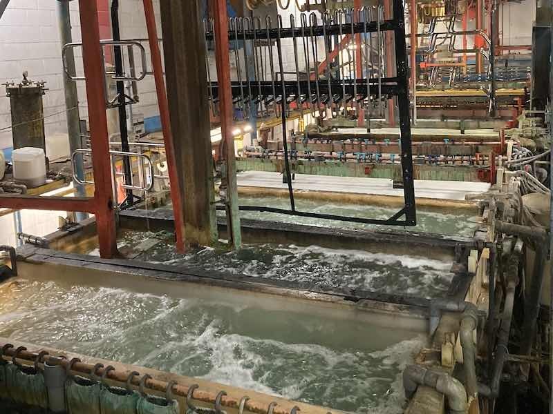 Reliable Plating Works and Elite Finishing in Milwaukee spent $600,000 renovated a plating line in 2022, adding new hoists, motors, and software to the line first installed in the early 1980s.