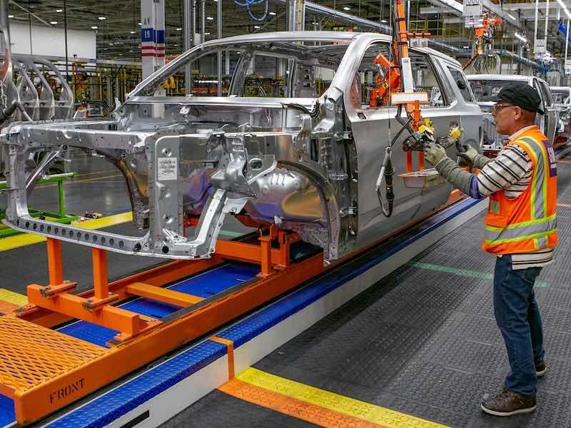 person assembling car