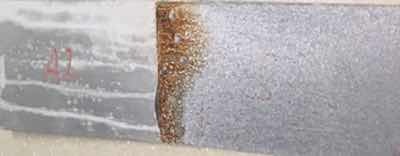 Fig. 4 Aluminium and galvanized steel testing sample after corrosion test.